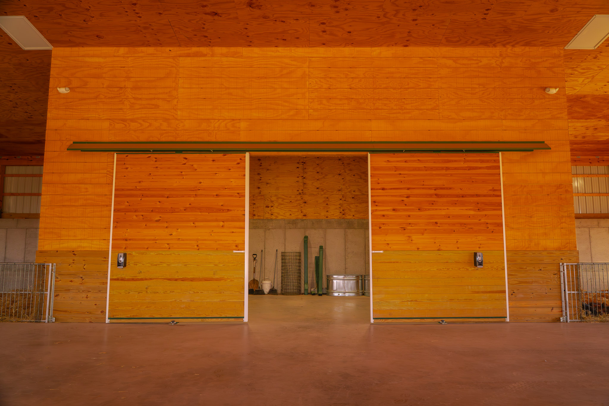 Post Frame Interior with Plywood Ceiling and Insulation